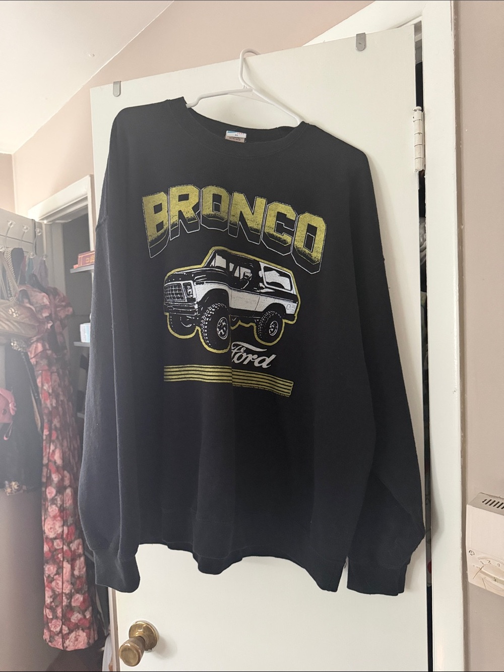 Junk Food Clothing Black Crewneck Sweater with Yellow Graphic